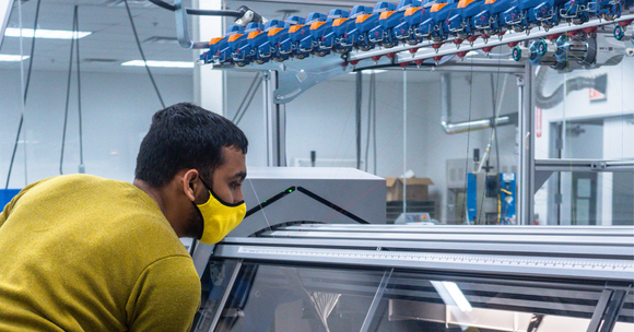 Myant & STOLL Unveil The Digital Textile Factory